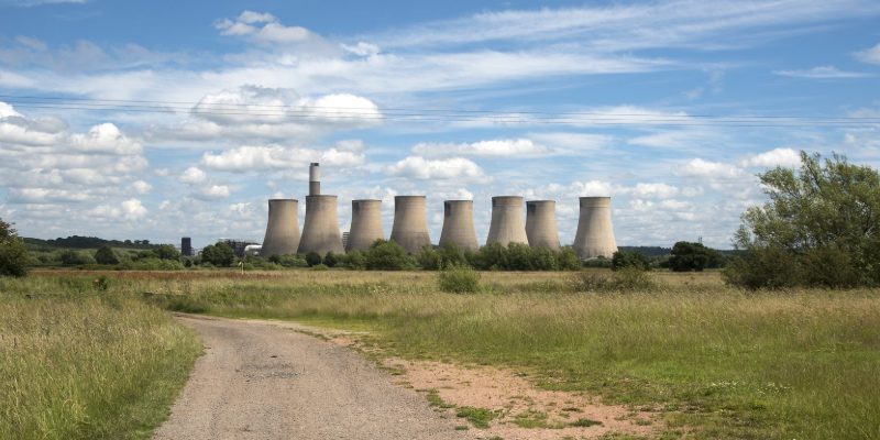 UK power station cooling towers, East Midlands — AI Growth Zone designations cluster around legacy grid and cooling infrastructure.